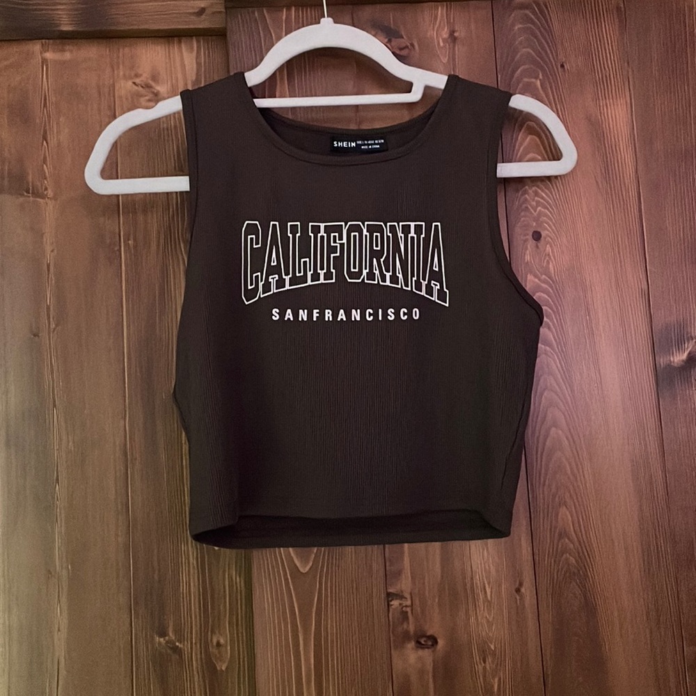 Brown, ribbed, Shein tank top. “California san francisco”